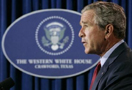 President Bush makes a statement from his ranch in Crawford, Texas, Sunday, Aug. 28, 2005, about the Iraq constitution process and Hurricane Katrina. (AP Photo/Susan Walsh) 