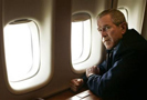 President Bush looks out the window of Air Force One inspecting damage from Hurricane Katrina while flying over New Orleans en route back to the White House, Wednesday, Aug. 31, 2005. (AP Photo/Susan Walsh)