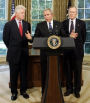 President Bush meets with former President George H.W. Bush, right, and former President Bill Clinton, left, in the Oval Office of the White House, Thursday, Sept. 1, 2005. Bush, who will tour the hurricane-devastated Gulf Coast region on Friday, has asked his father, former President George H.W. Bush, and former President Bill Clinton to lead a private fund-raising campaign for victims as they did for last year's Asian tsunami. (AP Photo/Susan Walsh)